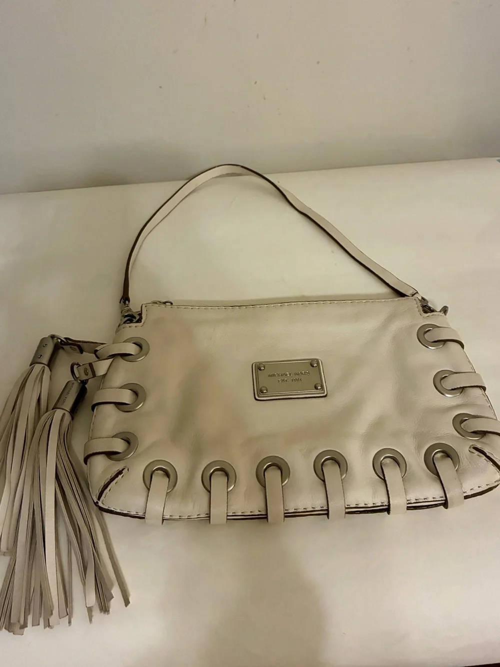 Michael Kors Astor Grommet Laced Tassel shoulder Bag  Off White